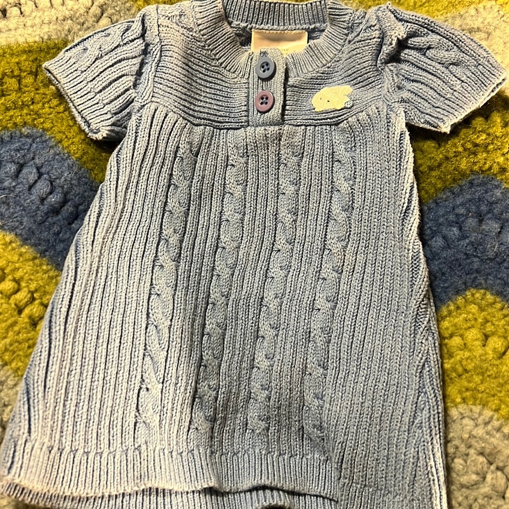 Light Carolina blue NC dress for a little girl slightly used  0-3 months